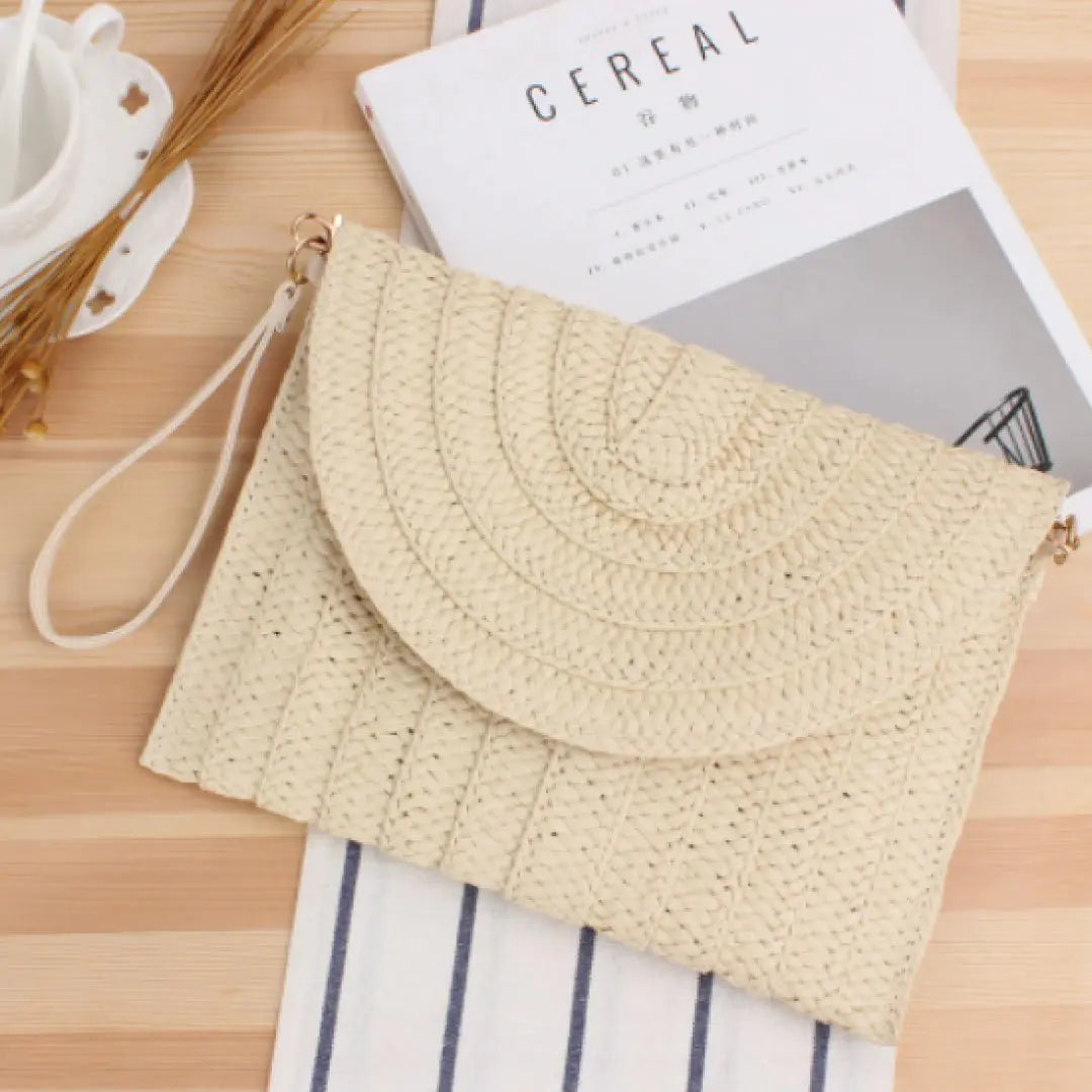 Ari Handwoven Straw Clutch WEM Support (www.WEM.support)