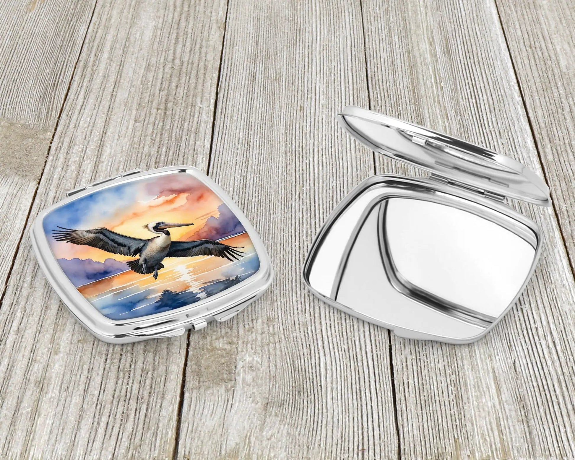 Pelican Fyling at Sunrise Compact Mirror WEM Support (www.WEM.support)